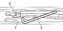 Установка в нулевое положение каретки (1) и ползуна (2) привода подъемно-сдвижной панели крыши