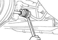 Снятие левого приводного вала от коробки передач с помощью стержня