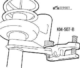 Использование съемника КМ-507-В для выпрессовки из стойки цапфы шарового шарнира рулевой тяги