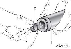Установка маслосъемного колпачка в монтажную оправку